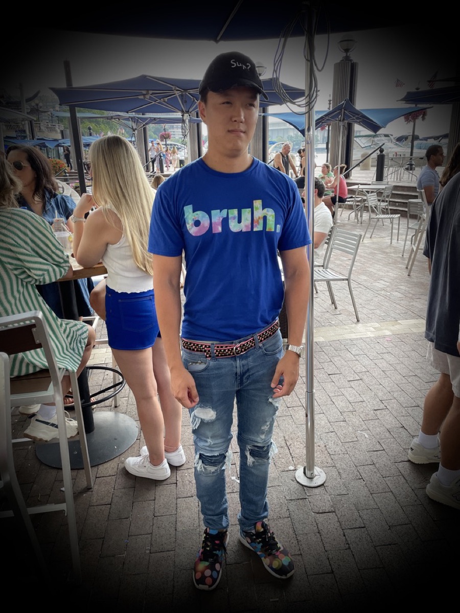 Brandon in his Costume Day punishment outfit at a bar